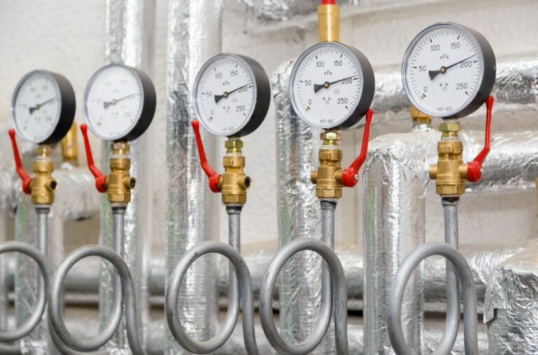 Set of manometers in industrial heating system in a boiler room